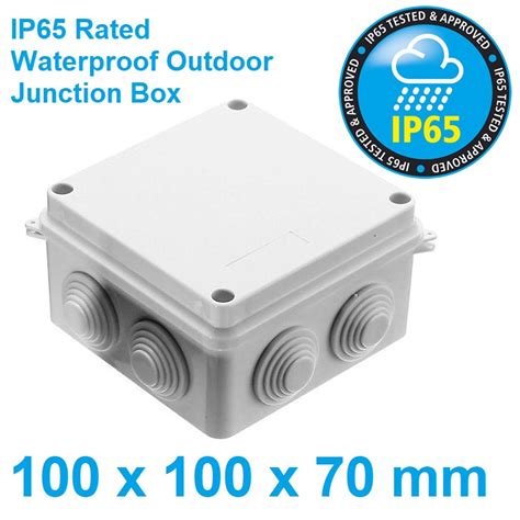 white box junction on road|white outdoor junction box.